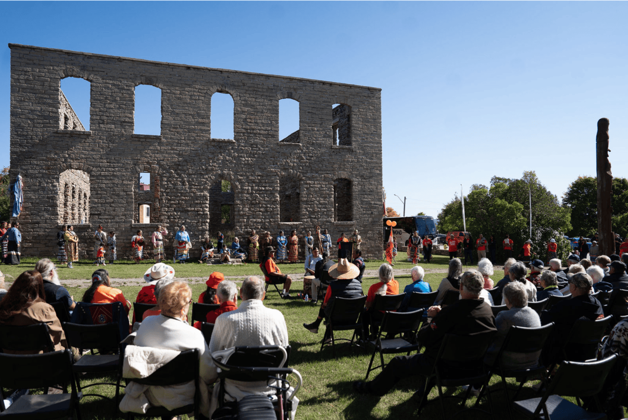Step on guide picture motorcoach at ruins